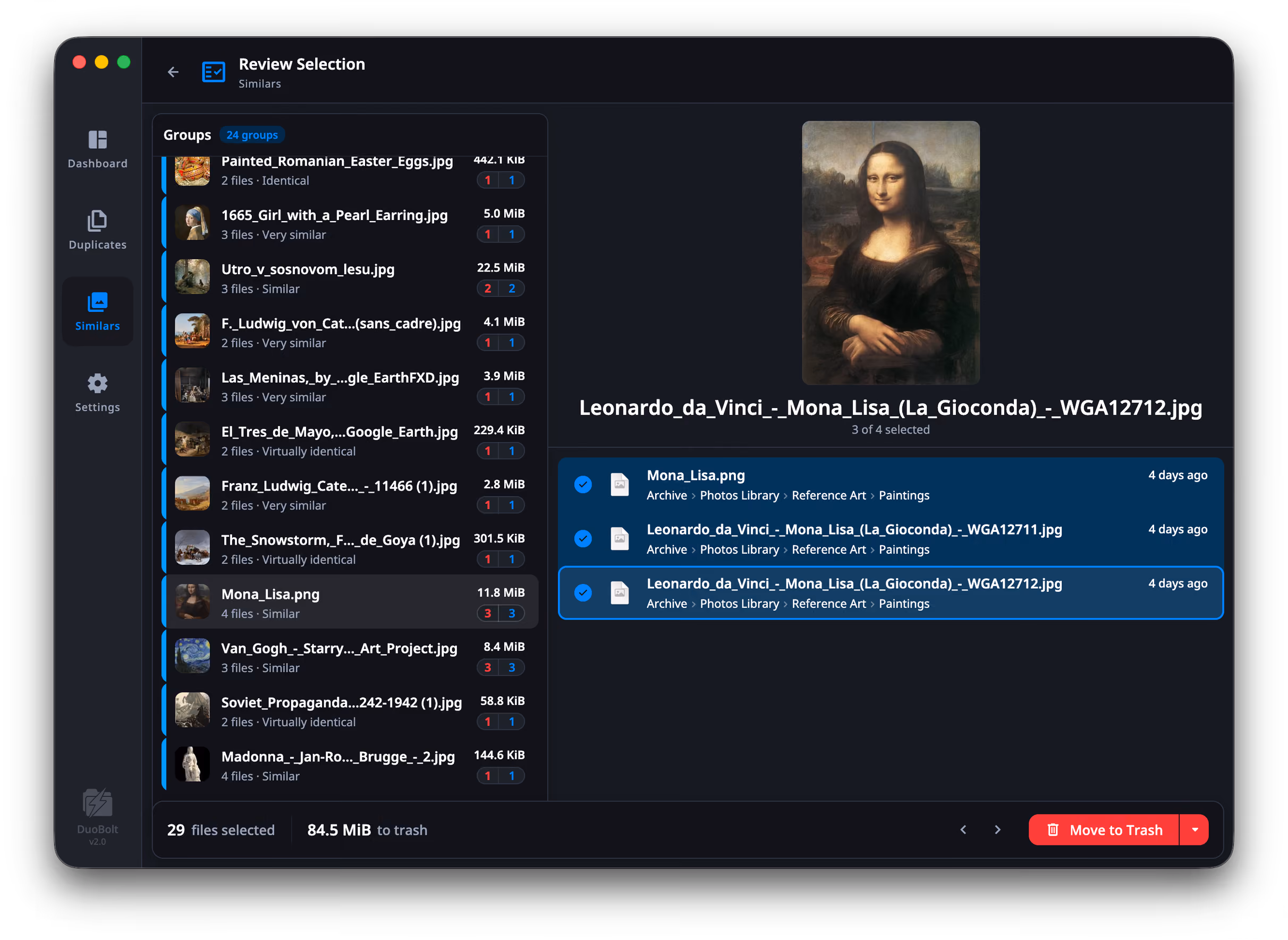The same Review Selection screen on the photos side: twenty-four groups labeled by how close the match is, from Identical to Similar, and a four-photo group of the Mona Lisa in the detail pane with three of the four marked. The footer reads 29 files selected, 84.5 MiB to trash.