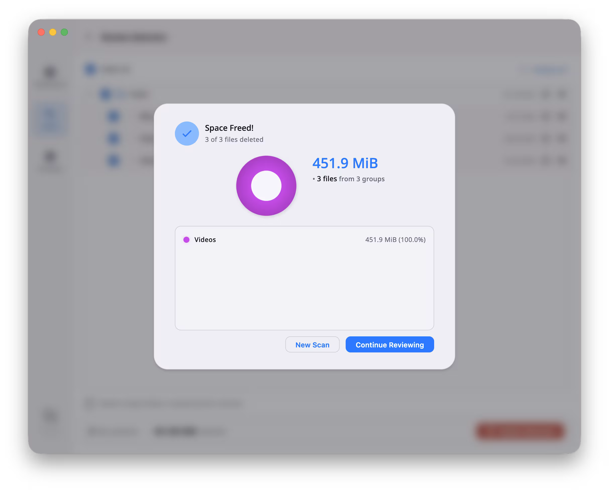 DuoBolt Desktop Space Freed dialog confirming three of three files deleted totalling 451.9 MiB with a donut chart breaking down the freed space by file type and New Scan or Continue Reviewing buttons